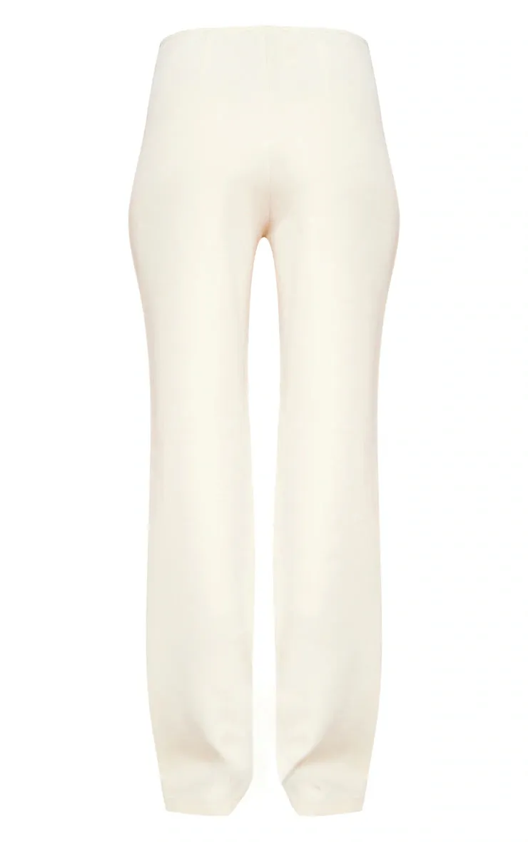 CREAM TAILORED LOW RISE SKINNY FLARED PANTS